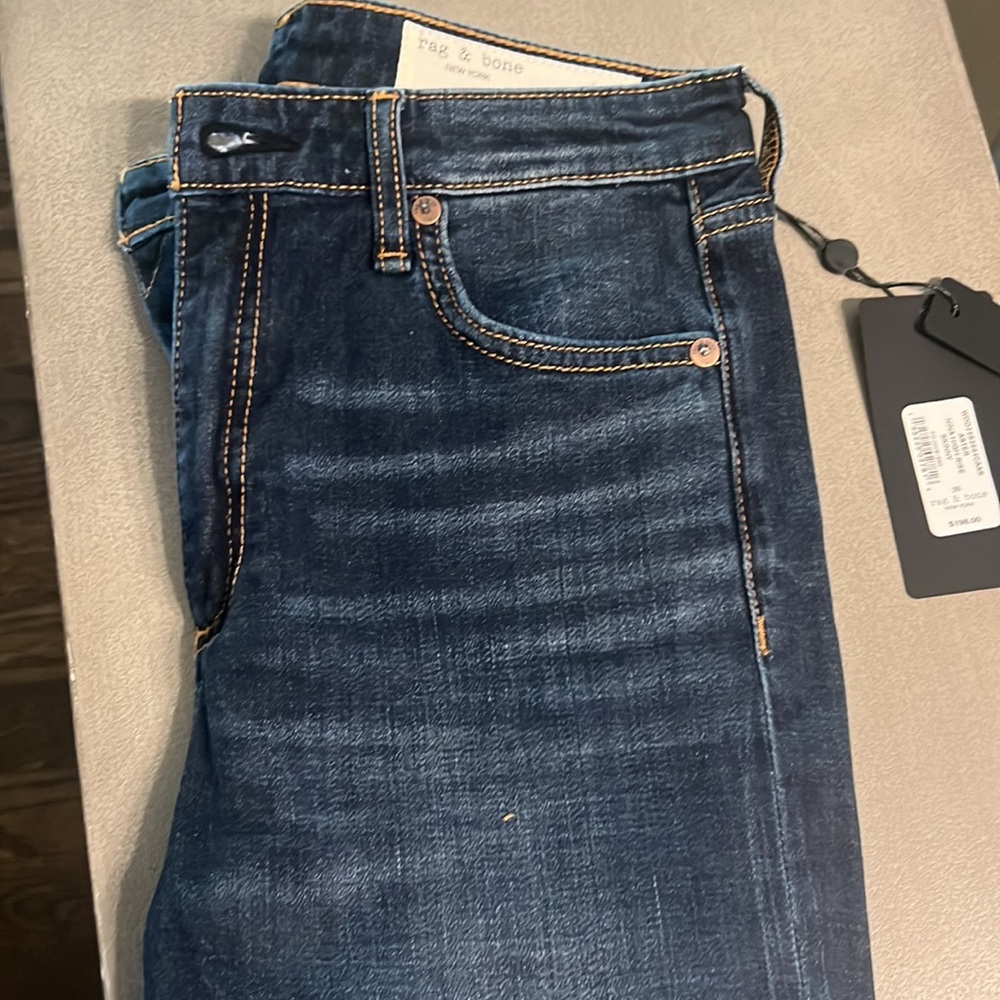 Nina High Rise Skinny run like a 27 way too big on me and long.